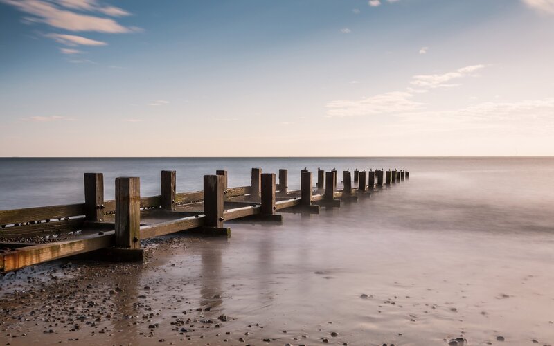 Wooden pier extending into the sea