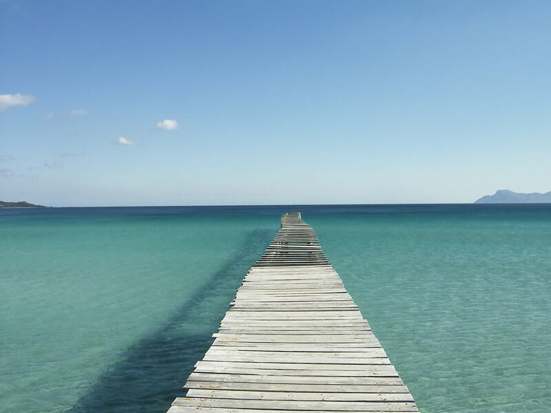 Wooden pier extending into the sea