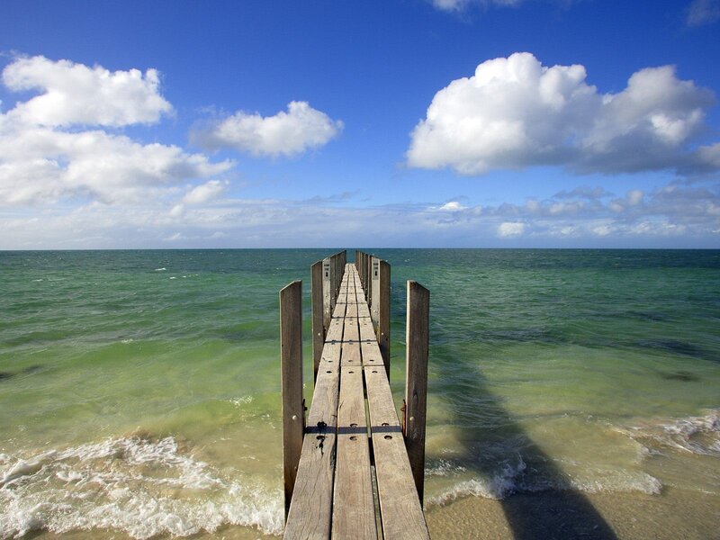 Wooden pier extending into the sea