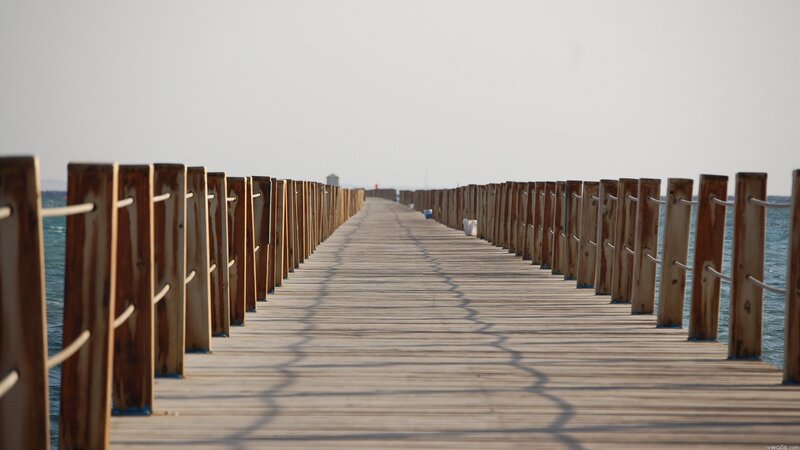 Wooden pier extending into the sea