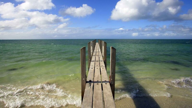 Wooden pier extending into the sea