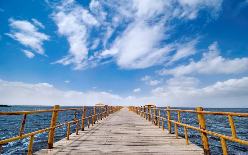 Wooden pier extending into the sea