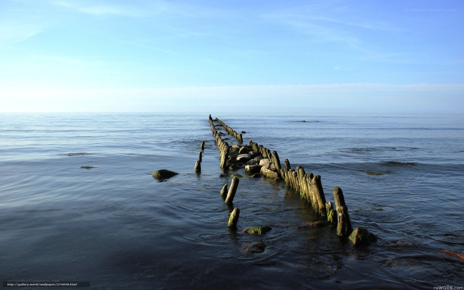 Wooden pier in calm sea