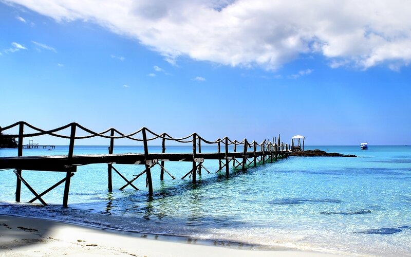 Wooden Pier on Beach — Blue, Serene, Afternoon, Photograph, Ocean