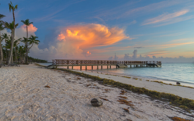 Wooden Pier on Beach — Blue, Serene, Sunset