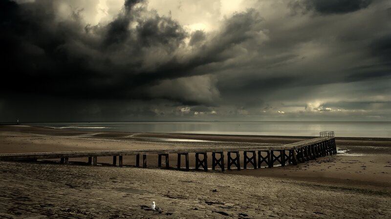 Wooden Pier on Beach — Gray, Dramatic