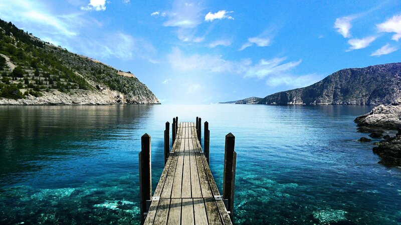 Wooden Pier on Blue Water — Serene