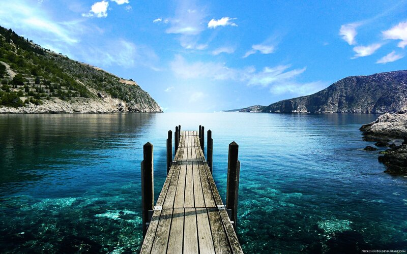 Wooden Pier on Blue Water