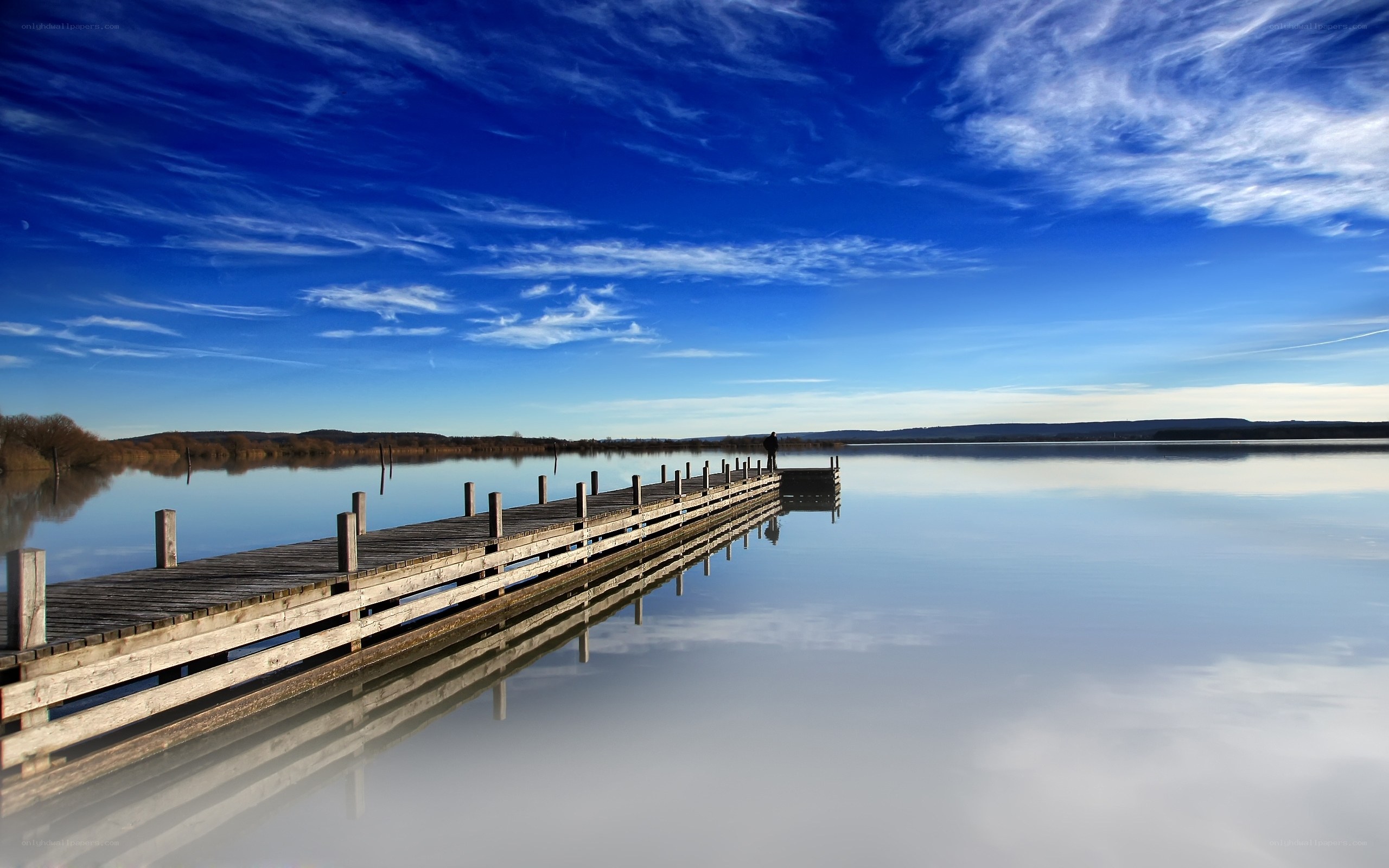Wooden pier on calm lake