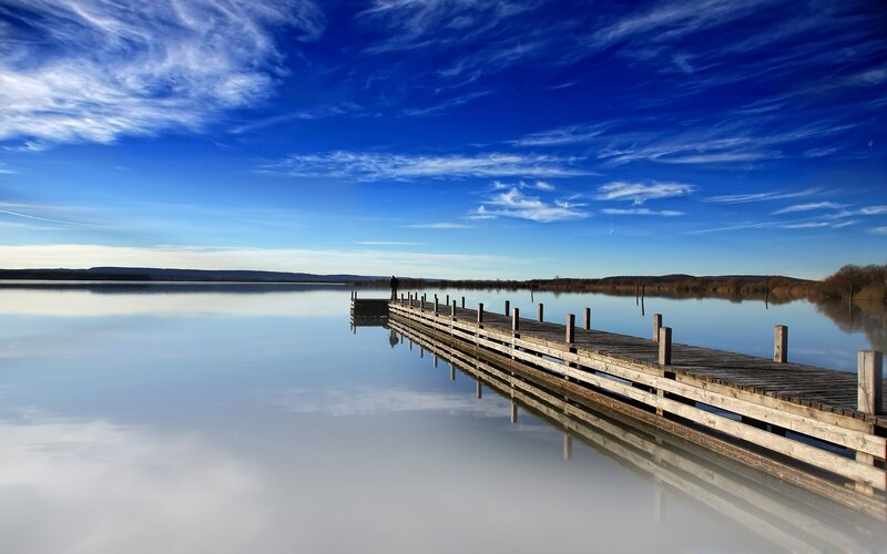 Wooden pier on calm lake