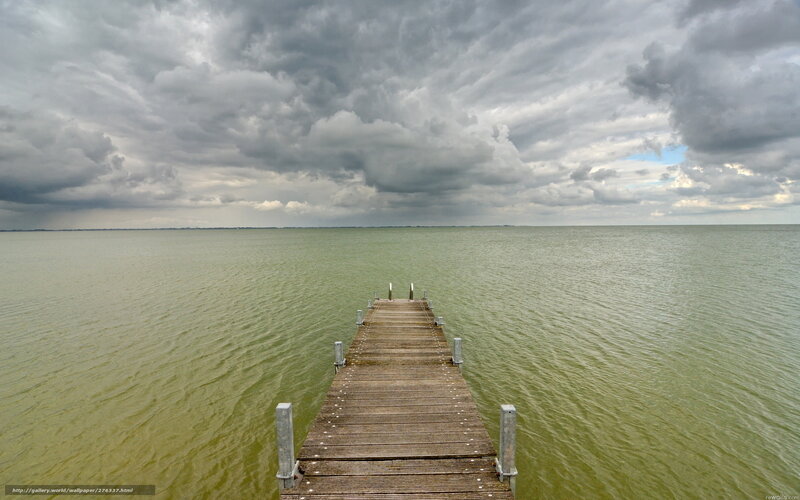 Wooden pier on calm lake