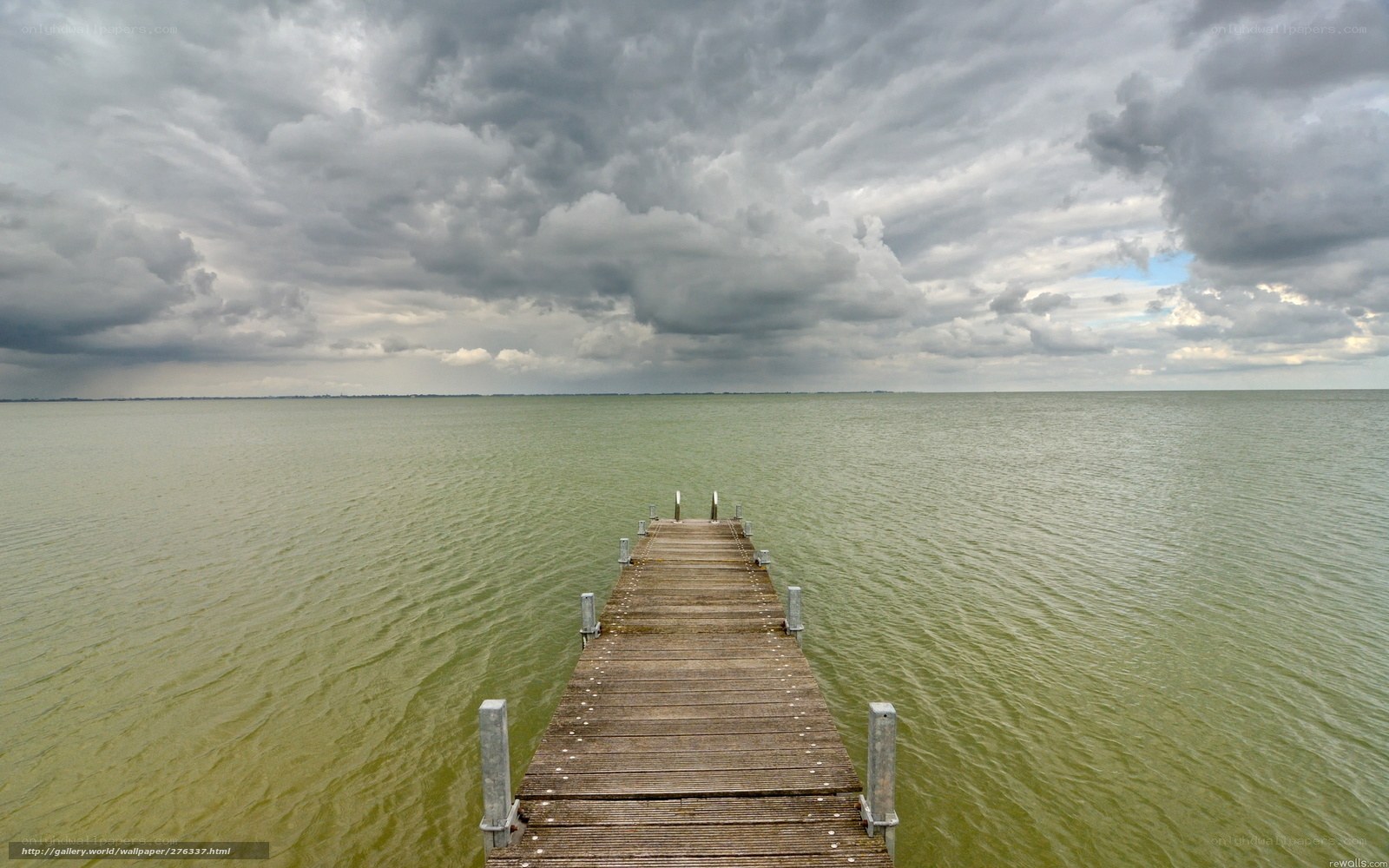 Wooden pier on calm lake