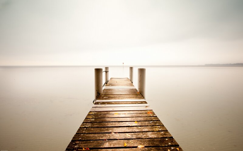 Wooden pier on calm water