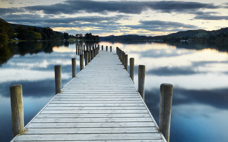Wooden Pier on Lake — Blue, Serene, Sunset, Photograph, Clouds