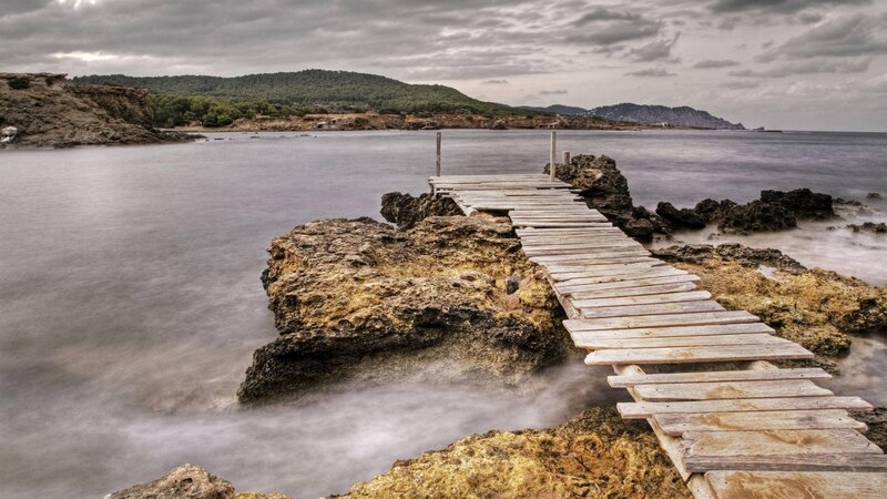 Wooden Pier on Rocks