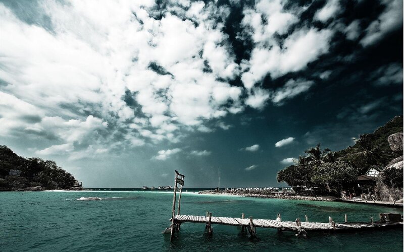 Wooden pier on tropical beach