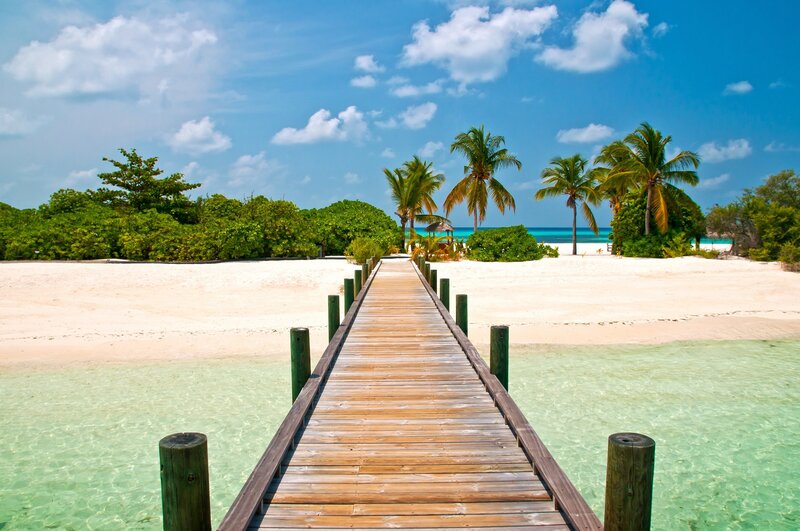 Wooden pier on tropical beach