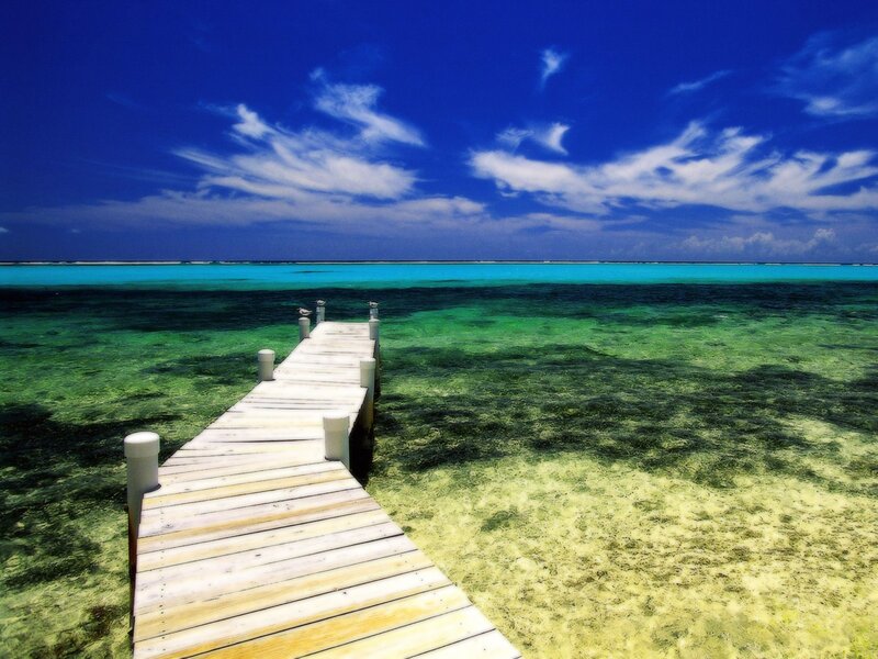Wooden pier on tropical beach
