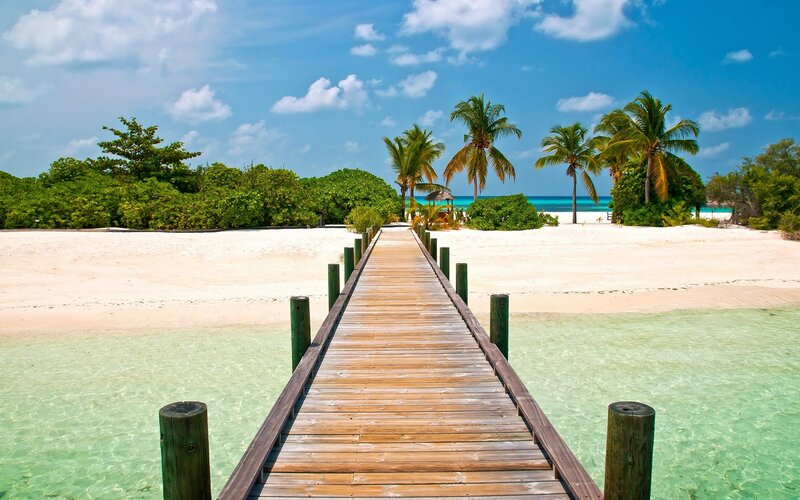 Wooden pier on tropical beach