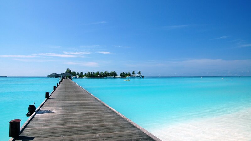 Wooden pier on turquoise water