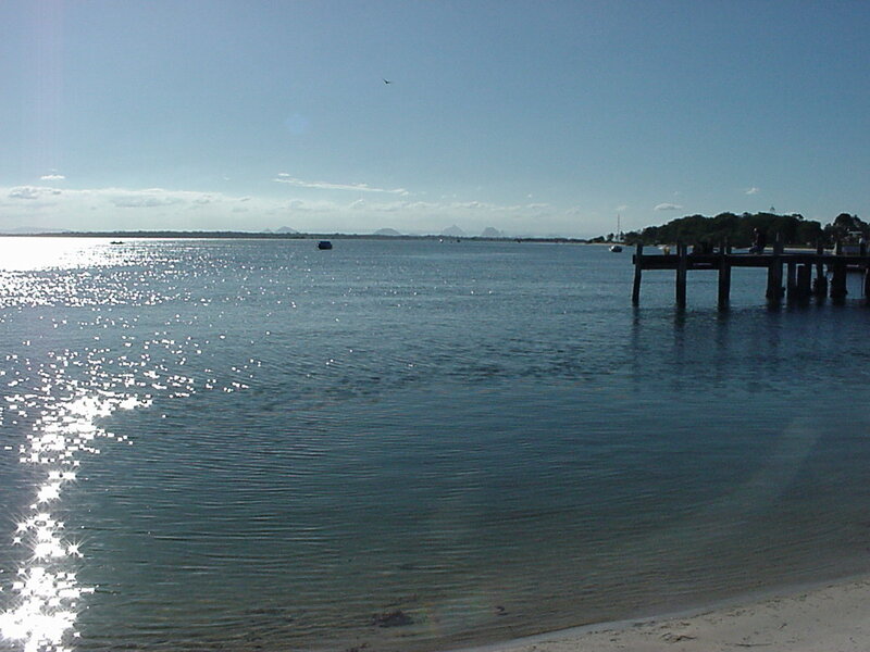 Wooden Pier on Water — Blue