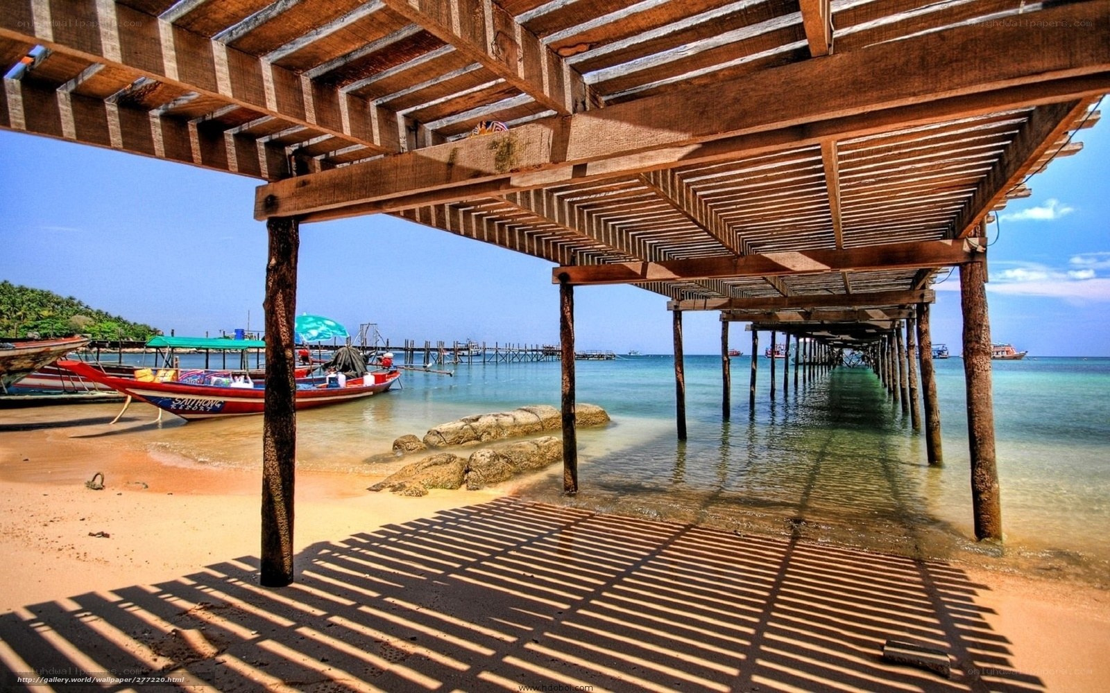 Wooden pier over beach