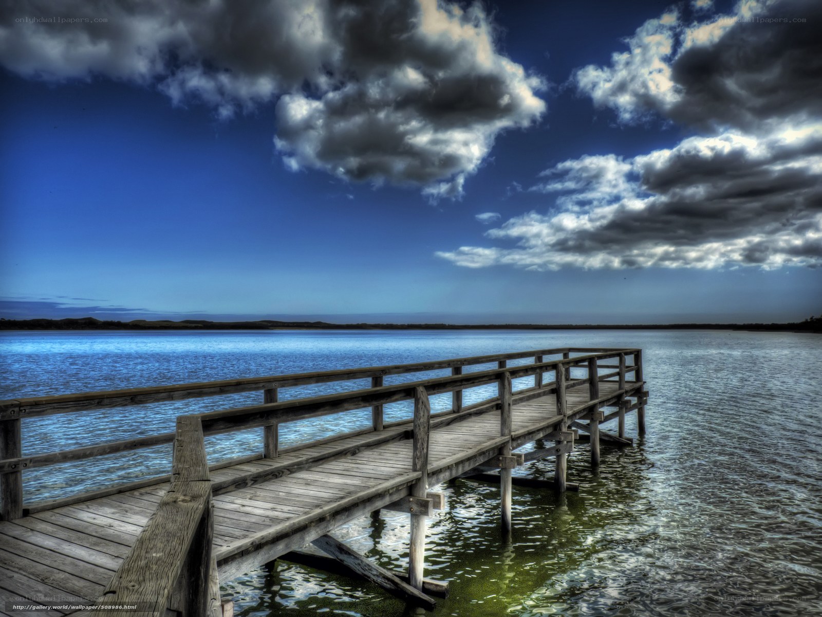 Wooden pier over calm lake