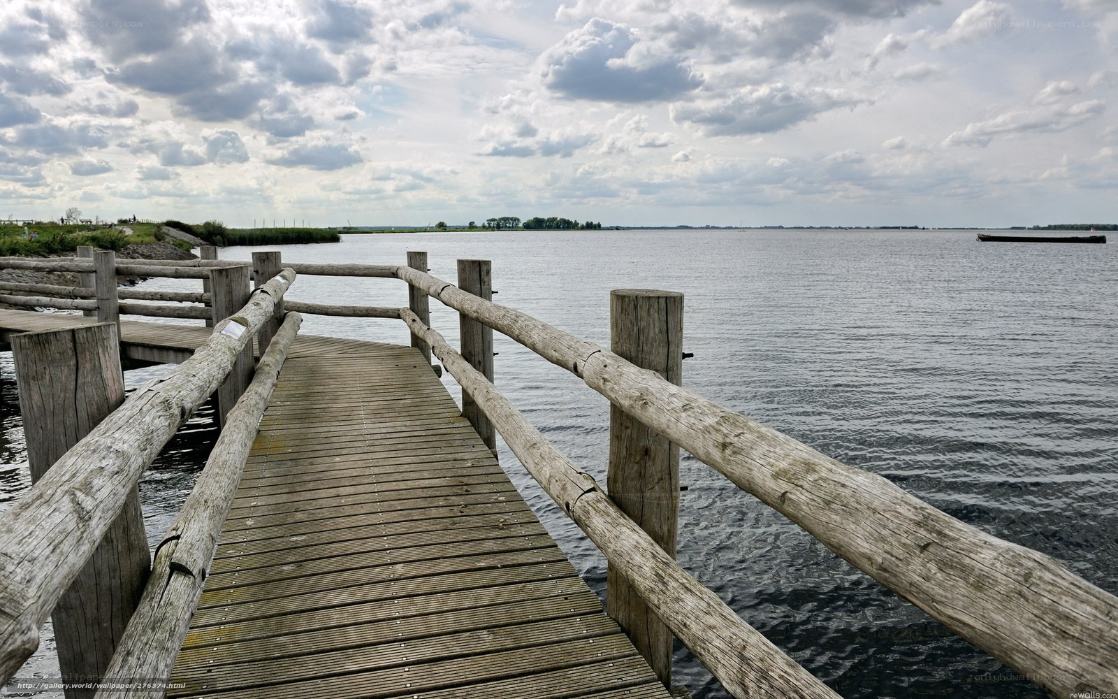 Wooden pier over calm water