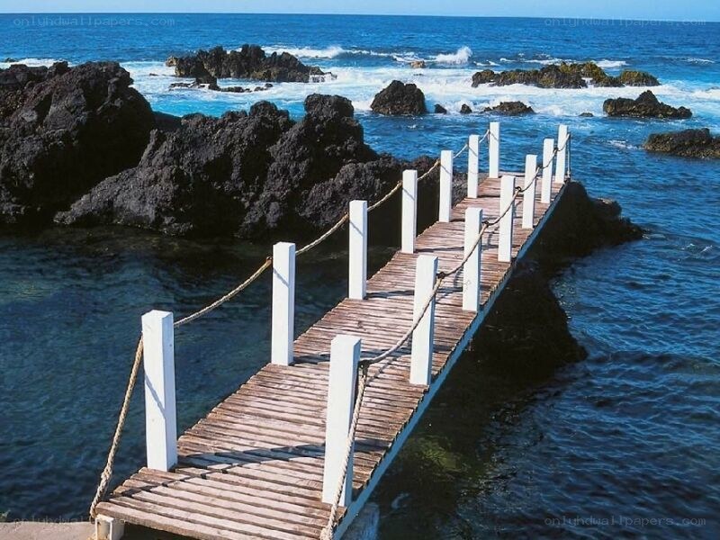 Wooden pier over ocean