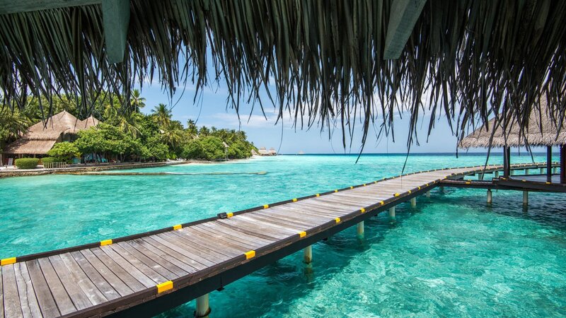 Wooden Pier over Turquoise Water — Blue