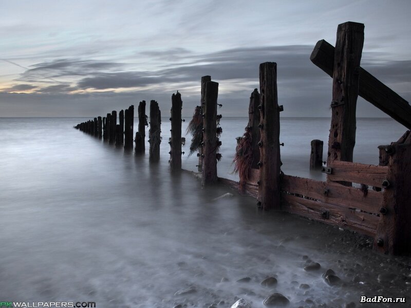Wooden Pier Posts — Gray