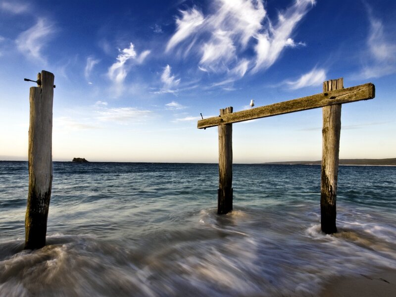 Wooden pier ruins at the beach