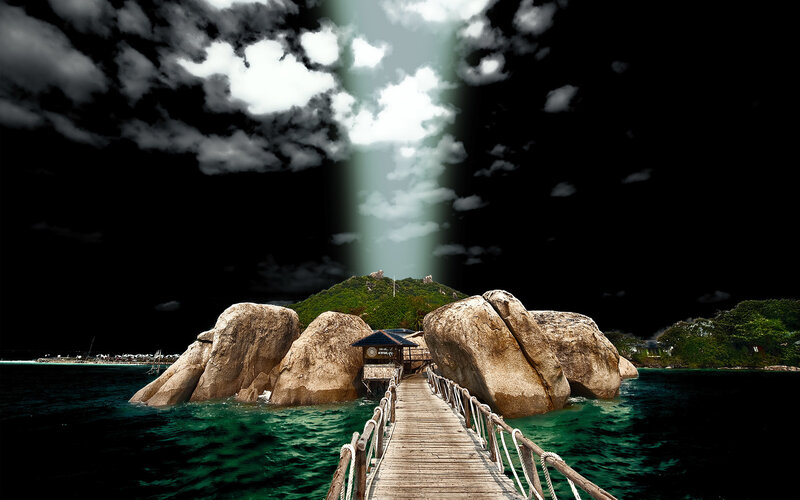Wooden pier to island with rocks