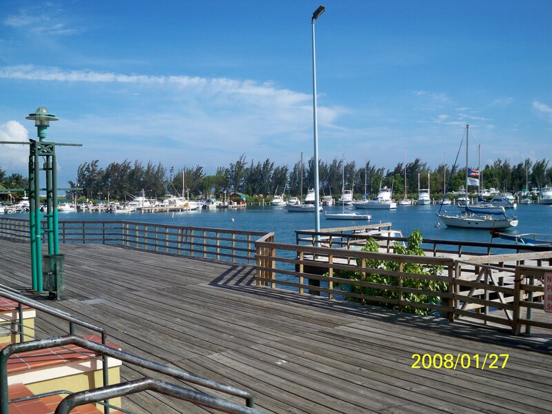 Wooden Pier with Boats — Blue