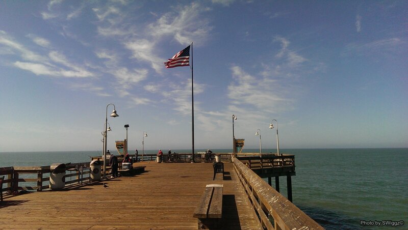 Wooden Pier with Flag