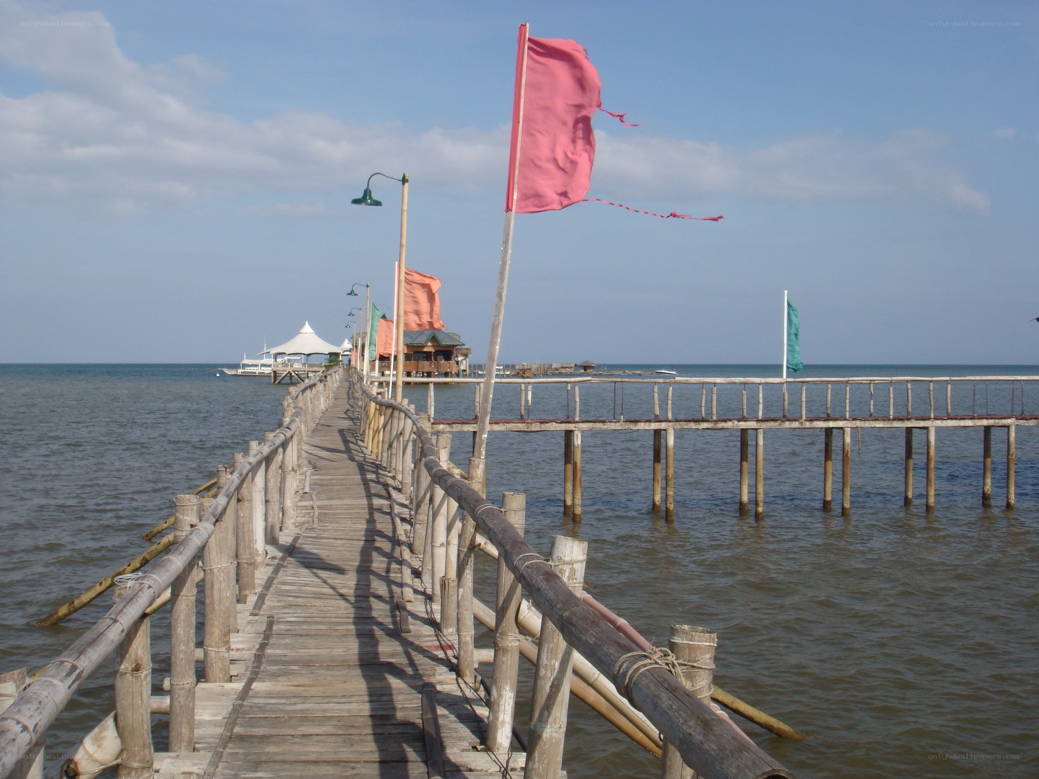 Wooden pier with flags