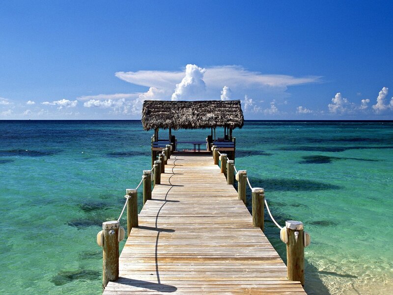 Wooden pier with thatched hut