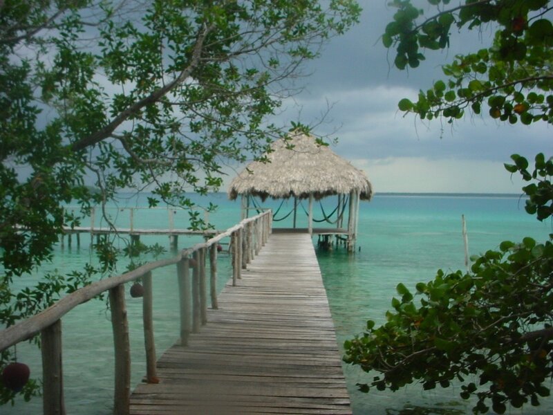 Wooden pier with thatched hut