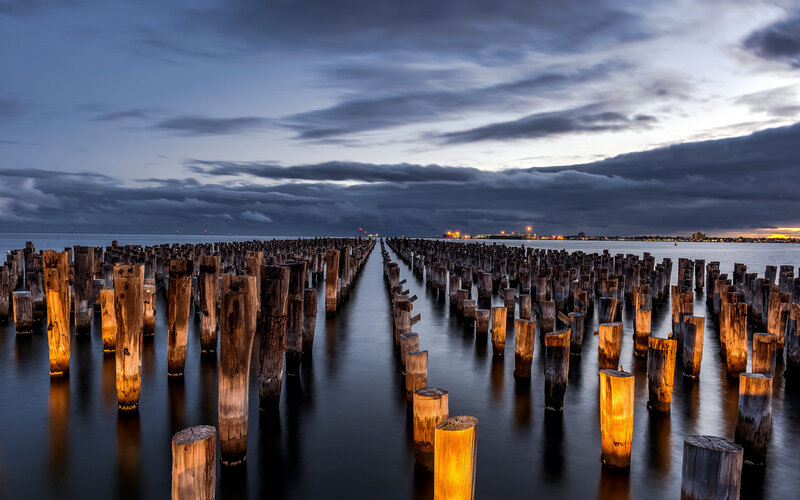 Wooden Pilings at Dusk — Blue