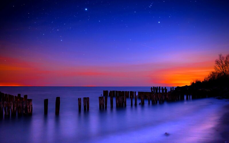 Wooden Pilings at Sunset — Blue, Serene