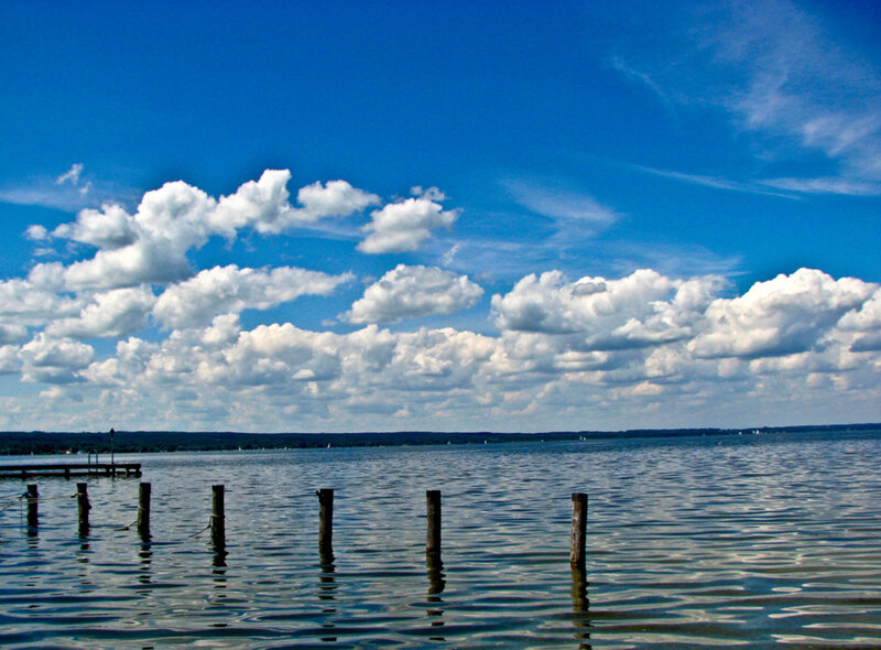 Wooden Posts in Lake — Blue