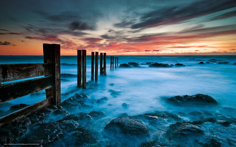 Wooden Posts in Ocean — Blue, Dramatic, Sunset