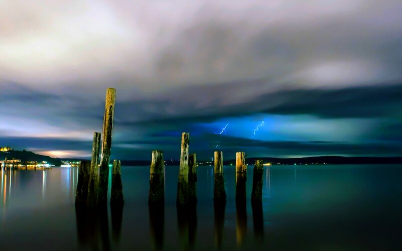 Wooden Posts in Water — Blue, Dramatic