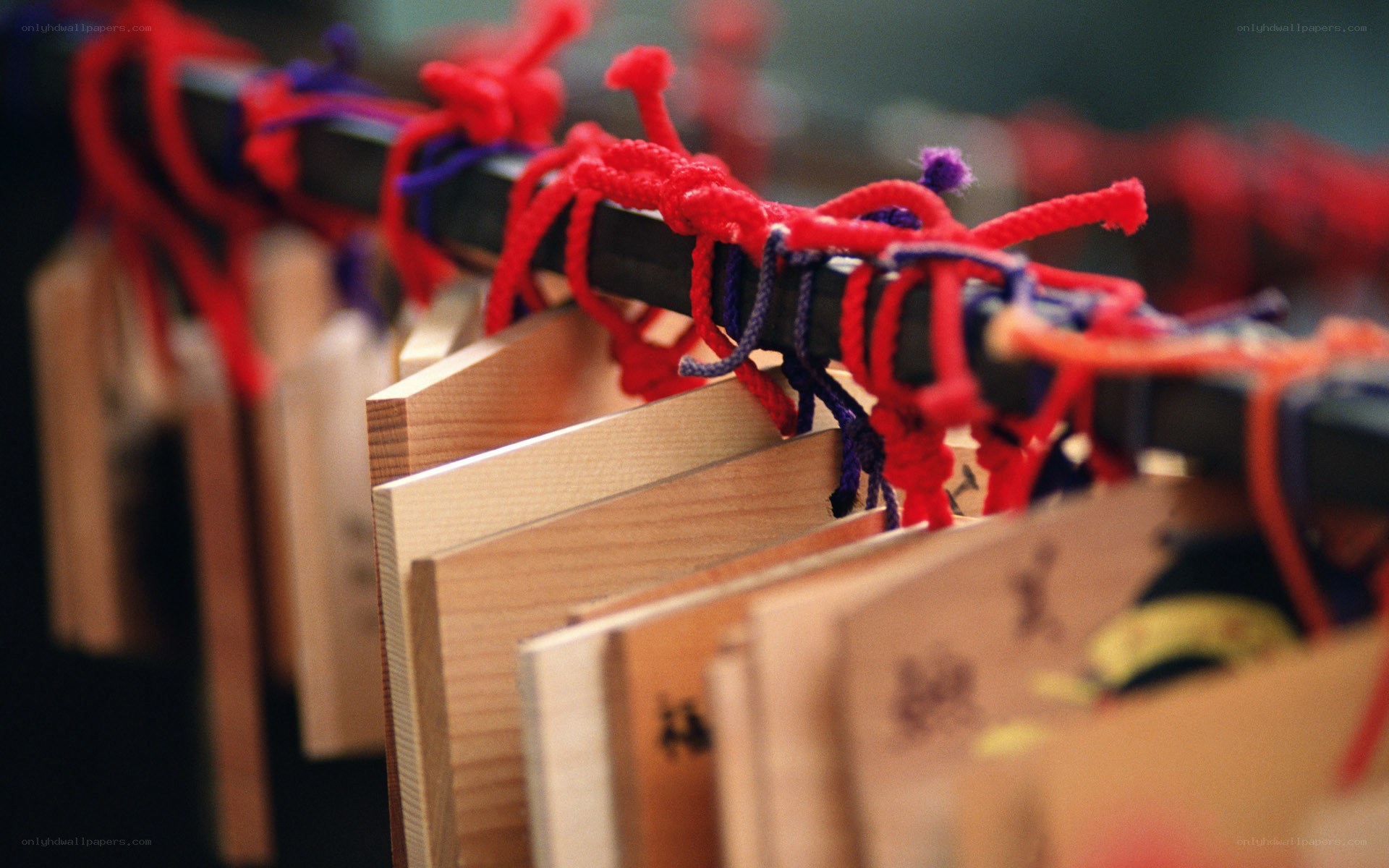 Wooden prayer plaques with ropes