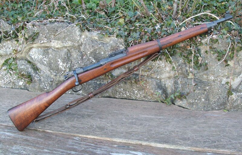 Wooden rifle on wooden surface