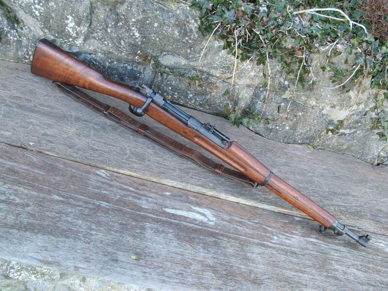 Wooden rifle on wooden surface