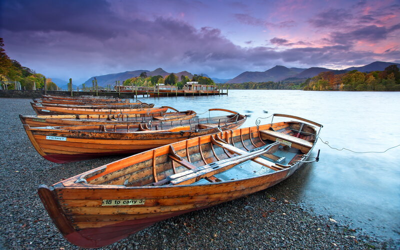 Wooden Rowboats on Shore