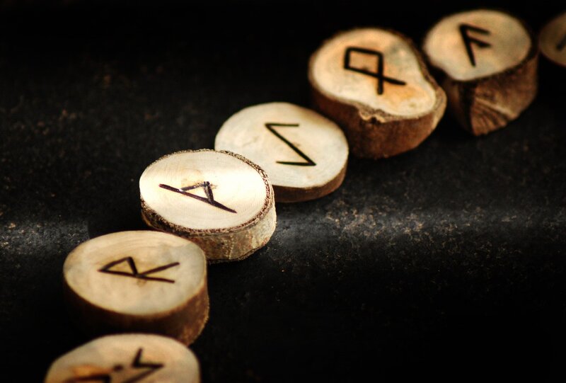 wooden runes with symbols