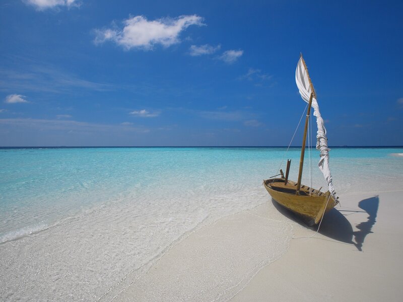 Wooden Sailboat on Beach — Blue, Serene, Afternoon