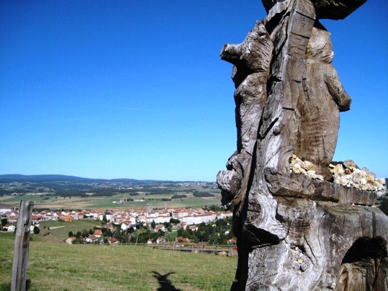 Wooden Sculpture on Hill